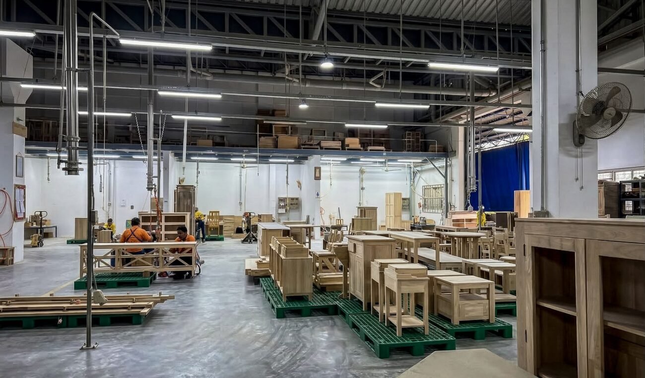 The main production hall at the Planet Furniture factory in Chonburi, Thailand, with furniture in progress
